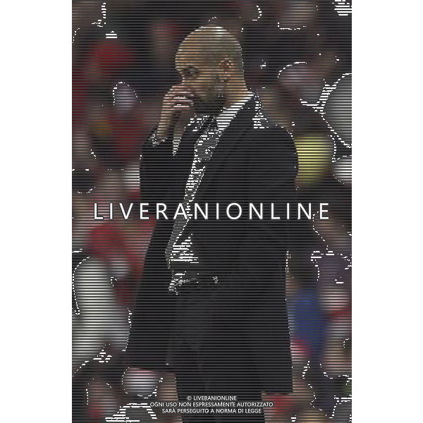 Barcelona\'s manager Josep Guardiola during the UEFA Champions League first round of 16 match between Arsenal and Barcelona FC in the Emirates Stadium, north London, Britain, 16 February 2011. AG. ALDO LIVERANI SAS ITALY ONLY