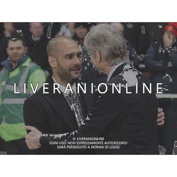 BarcelonaŠs manager Josep Guardiola (left) greets ArsenalŠs manager Arsene Wenger during the UEFA Champions League first round of 16 match between Arsenal and Barcelona FC in the Emirates Stadium, north London, Britain, 16 February 2011. AG. ALDO LIVERANI SAS ITALY ONLY