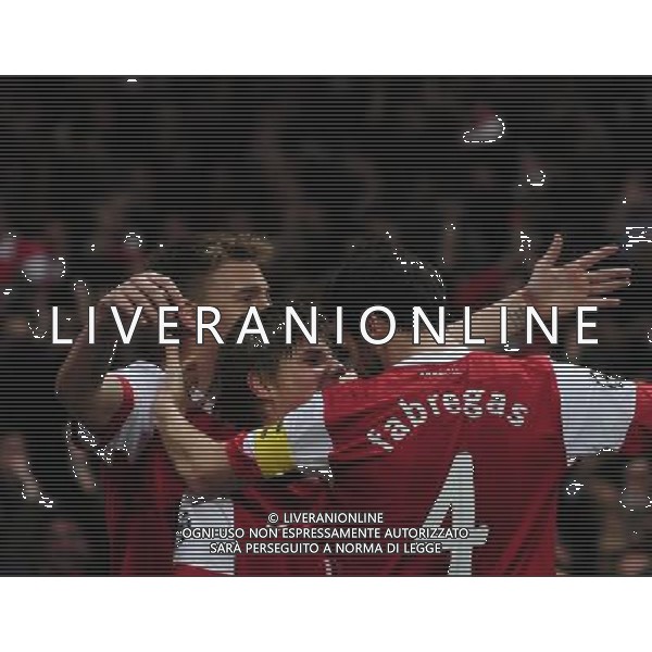 (110217) -- LONDON, Feb. 17, 2011 () -- Andrey Arshavin (C) of Arsenal celebrates his goal with teammate Nicklas Bendtner and Cesc Fabregas during their UEFA Champions League match against Barcelona at the Emirates Stadium in London, Britain, Feb. 16, 2011. Arsenal won by 2-1. (/Zeng Yi) AG. ALDO LIVERANI SAS ITALY ONLY