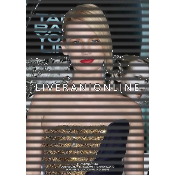 January Jones Photo by Gilbert Flores \'Unknown\' Los Angeles Premiere at the Village Theatre February 16, 2011 - Westwood, California AG. ALDO LIVERANI SAS ITALY ONLY