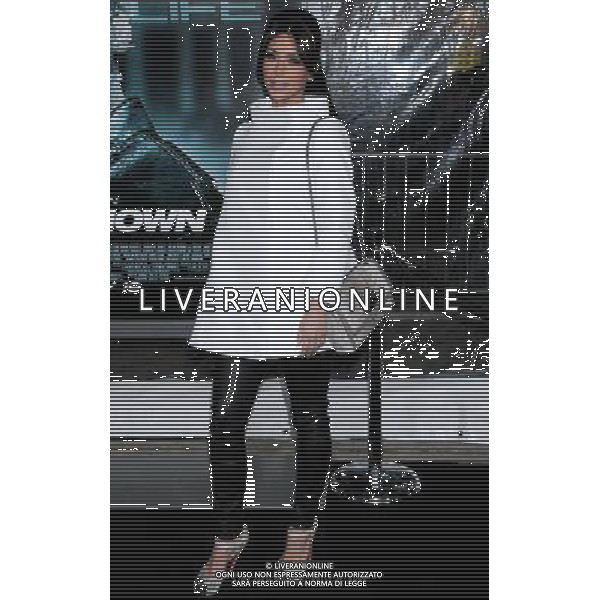 Kim Kardashian Photo by Gilbert Flores \'Unknown\' Los Angeles Premiere at the Village Theatre February 16, 2011 - Westwood, California AG. ALDO LIVERANI SAS ITALY ONLY