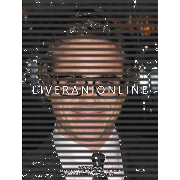 Robert Downey Jr. Photo by Gilbert Flores \'Unknown\' Los Angeles Premiere at the Village Theatre February 16, 2011 - Westwood, California AG. ALDO LIVERANI SAS ITALY ONLY