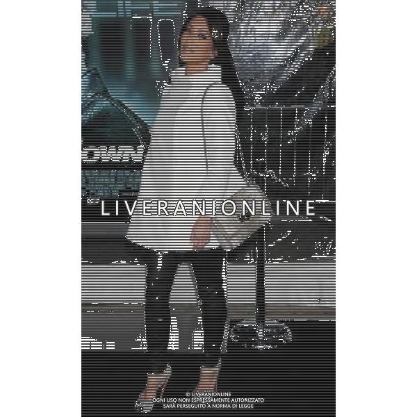 Kim Kardashian Photo by Gilbert Flores \'Unknown\' Los Angeles Premiere at the Village Theatre February 16, 2011 - Westwood, California AG. ALDO LIVERANI SAS ITALY ONLY