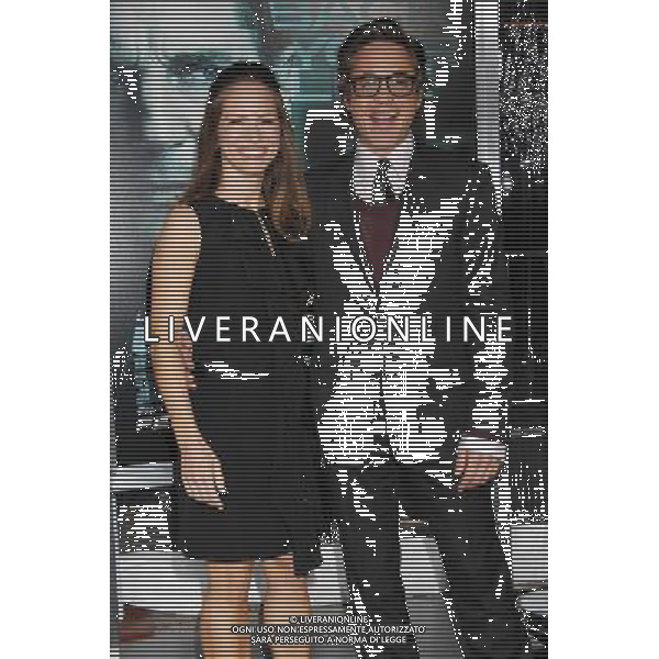 Susan Downey and husband Robert Downey Jr. Photo by Janet Gough \'Unknown\' Los Angeles Premiere at the Regency Village Theater February 16, 2011 - Westwood, California AG. ALDO LIVERANI SAS ITALY ONLY