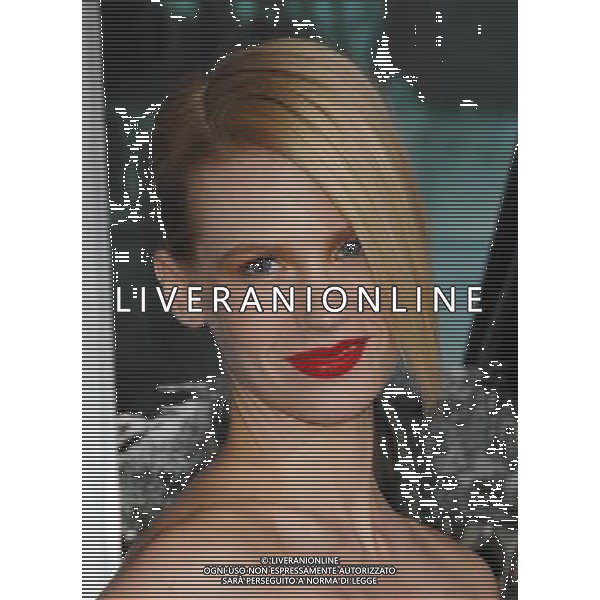 January Jones Photo by Janet Gough \'Unknown\' Los Angeles Premiere at the Regency Village Theater February 16, 2011 - Westwood, California AG. ALDO LIVERANI SAS ITALY ONLY