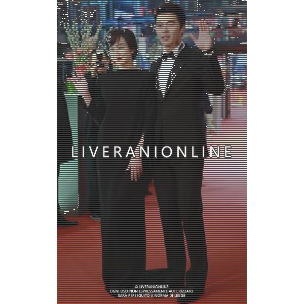 (110217) -- BERLIN, Feb. 17, 2011 () -- South Korean actor Bin Hyun (R) and actress Soo-jung Lim of the film \'Come Rain, Come Shine\' pose for the global premiere of the film at the 61st Berlinale International Film Festival in Berlin, capital of Germany, Feb. 17, 2011. The film is the sole Asian contender for the Berlin Film Festival\'s Golden Bear top prize. (/Luo Huanhuan) (wjd) AG. ALDO LIVERANI SAS ITALY ONLY
