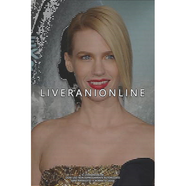 16 February 2011 - Westwood, California - January Jones. \'Unknown\' Los Angeles Premiere held at the Regency Village Theater. Photo Credit: Byron Purvis/AdMedia AG. ALDO LIVERANI SAS ITALY ONLY *** Local Caption *** .