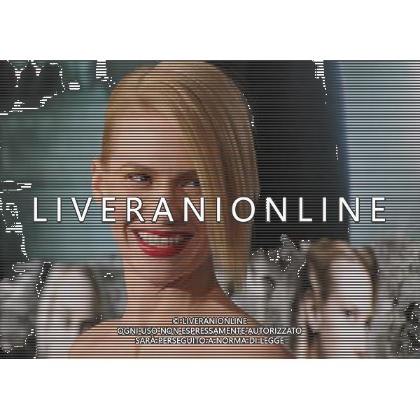 16 February 2011 - Westwood, California - January Jones. \'Unknown\' Los Angeles Premiere held at the Regency Village Theater. Photo Credit: Byron Purvis/AdMedia AG. ALDO LIVERANI SAS ITALY ONLY *** Local Caption *** .