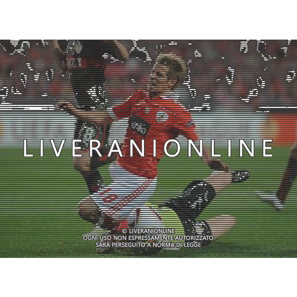 20110217: LISBON, PORTUGAL - SL Benfica vs VfB Stuttgart: Europa League 2010/2011, 1/16 finals, 1st leg. In picture: Fabio Coentrao (Benfica) and Sven Ulreich (Stuttgart). PHOTO: Alvaro Isidoro/CITYFILES -AG ALDO LIVERANI 