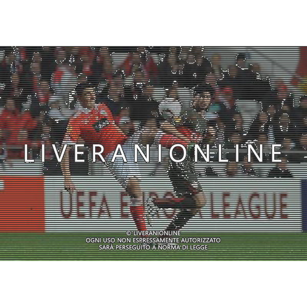 20110217: LISBON, PORTUGAL - SL Benfica vs VfB Stuttgart: Europa League 2010/2011, 1/16 finals, 1st leg. In picture: Oscar Cardozo (Benfica) and Serdar Tasci (Stuttgart). PHOTO: Alvaro Isidoro/CITYFILES -AG ALDO LIVERANI 