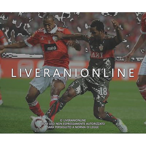 20110217: LISBON, PORTUGAL - SL Benfica vs VfB Stuttgart: Europa League 2010/2011, 1/16 finals, 1st leg. In picture: Sidnei (Benfica) and Cacau (Stuttgart). PHOTO: Alvaro Isidoro/CITYFILES -AG ALDO LIVERANI 