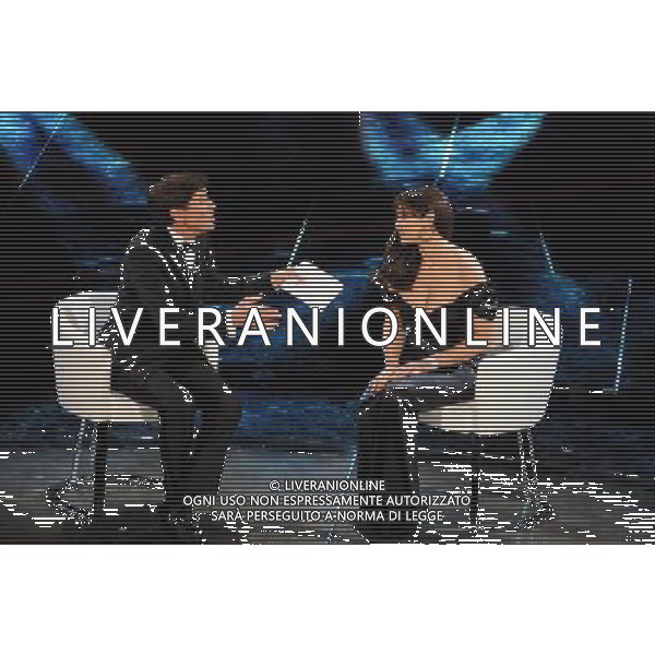 61mo FESTIVAL DELLA CANZONE ITALIANA DI SANREMO 18/02/2011 - QUARTA SERATA NELLA FOTO GIANNI MORANDI CON MONICA BELLUCCI ©GAZZANIGA/AGENZIA ALDO LIVERANI SAS
