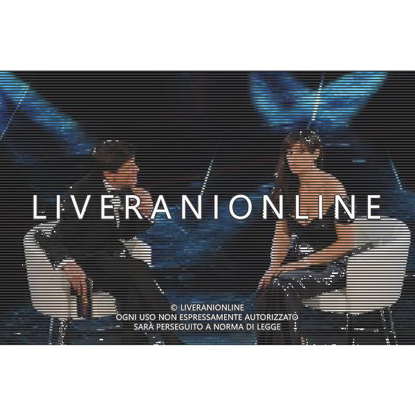 61mo FESTIVAL DELLA CANZONE ITALIANA DI SANREMO 18/02/2011 - QUARTA SERATA NELLA FOTO GIANNI MORANDI CON MONICA BELLUCCI ©GAZZANIGA/AGENZIA ALDO LIVERANI SAS