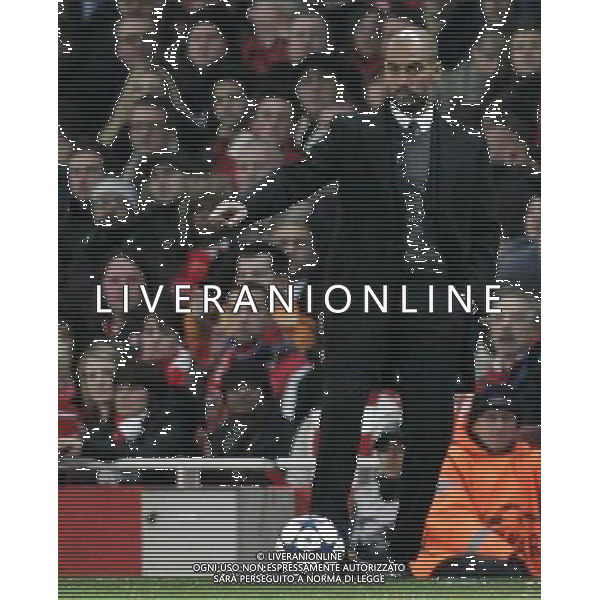 Barcelona\'s Manager Josep Guardiola on ball 16.02.2011 - LONDON - UEFA CHAMPIONS LEAGUE MATCH - LEG 1 - ARSENAL V BARCELONA - EMIRATES STADIUM - ARSENAL - LONDON FOTO MICHAL ZEMANEK/NEWSPIX.PL --- Newspix.pl /AG ALDO LIVERANI SAS CALCIO SPORT CHAMPION LEAGUE ARSENAL BARCELONA - ITALY ONLY - *** Local Caption *** .