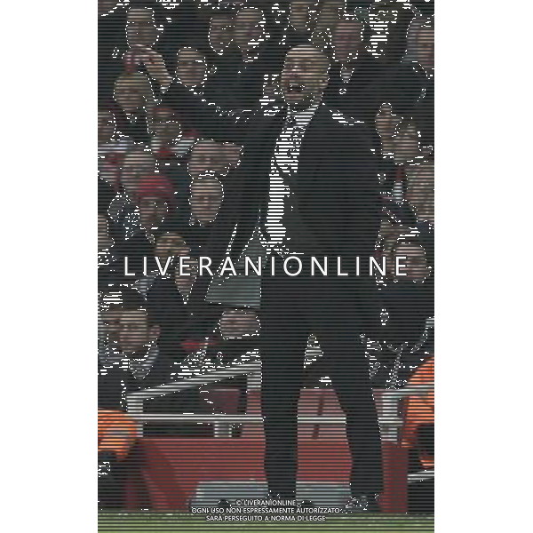 Barcelona\'s Manager Josep Guardiola reacts 16.02.2011 - LONDON - UEFA CHAMPIONS LEAGUE MATCH - LEG 1 - ARSENAL V BARCELONA - EMIRATES STADIUM - ARSENAL - LONDON FOTO MICHAL ZEMANEK/NEWSPIX.PL --- Newspix.pl /AG ALDO LIVERANI SAS CALCIO SPORT CHAMPION LEAGUE ARSENAL BARCELONA - ITALY ONLY - *** Local Caption *** .