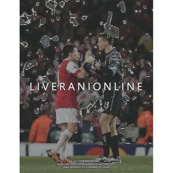 Arsenal\'s Samir Nasri celebrates with team mate Wojciech Szczesny after the final whistle 16.02.2011 - LONDON - UEFA CHAMPIONS LEAGUE MATCH - LEG 1 - ARSENAL V BARCELONA - EMIRATES STADIUM - ARSENAL - LONDON FOTO MICHAL ZEMANEK/NEWSPIX.PL --- Newspix.pl /AG ALDO LIVERANI SAS CALCIO SPORT CHAMPION LEAGUE ARSENAL BARCELONA - ITALY ONLY - *** Local Caption *** .