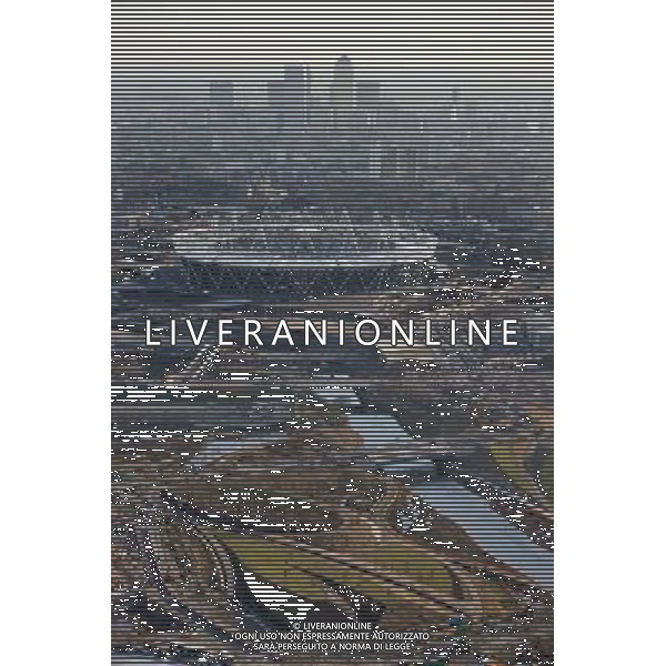 Olympic Stadium Aerial. Aerial view of the Olympic Stadium with Canary Wharf in the background. ©photoshot/Agenzia Aldo Liverani Sas - ITALY ONLY - Veduta panoramica aerea del sito del Parco Olimpico, dove si svolgeranno le Olimpiadi di Londra 2012