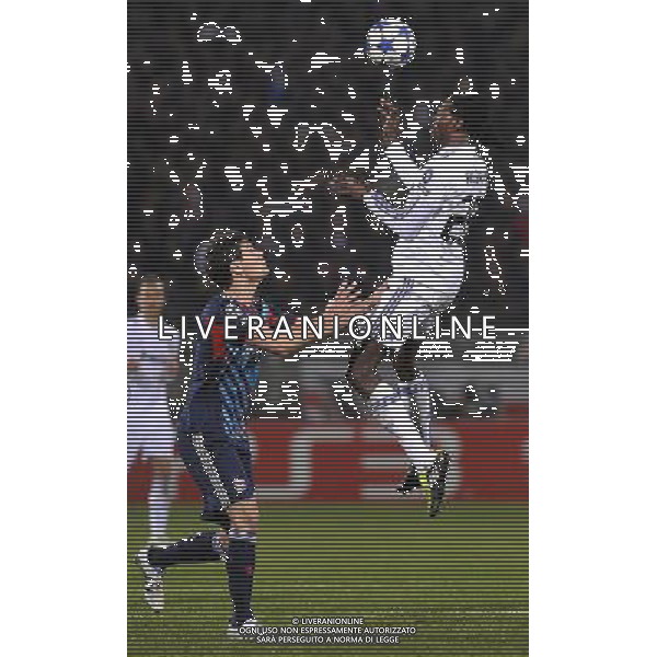 (110223) -- LYON, Feb. 23, 2011 () -- Real Madrid\'s Emmanuel Adebayor(R) heads the ball during the UEFA Champions League football match against Olympique de Lyon at the Gerland stadium in Lyon, central eastern France, Feb. 22, 2011. The match tied with a 1-1 draw. (/Laurent Zablon) (xm) ©photoshot/Agenzia Aldo Liverani Sas - ITALY ONLY - Olimpique Lione - Real Madrid Champions League 22/02/2011