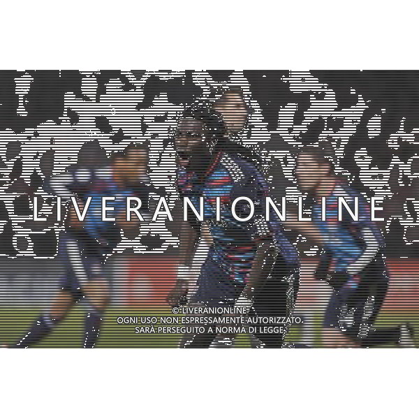 (110223) -- LYON, Feb. 23, 2011 () -- Bafetimbi Gomis(front) of Olympique de Lyon celebrates the goal during the UEFA Champions League football match against Real Madrid at the Gerland stadium in Lyon, central eastern France, Feb. 22, 2011. The match tied with a 1-1 draw. (/Laurent Zablon) (xm) ©photoshot/Agenzia Aldo Liverani Sas - ITALY ONLY - Olimpique Lione - Real Madrid Champions League 22/02/2011