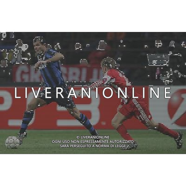Milano 23-02-2011 Champions League 2010/11 inter-bayern monaco 0:1 nella foto dejan stankovic e philipp lahm ph marco luzzani/ag aldo liverani s.a.s.