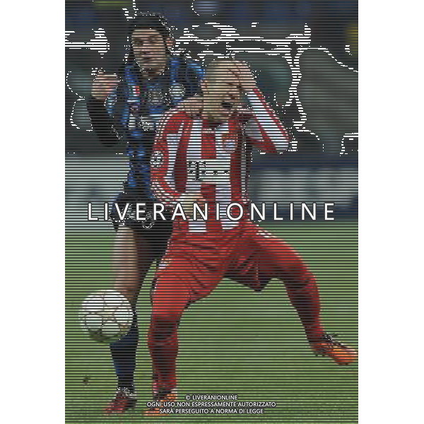 UEFA Champions League 2010/2011 Round of 16 Milano - 23.02.2011 Inter-Bayern Monaco Nella Foto:Arjen Robben-Cristian Chivu /Ph.Vitez-Ag. Aldo Liverani
