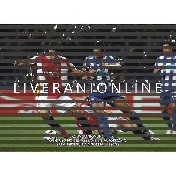 20110223: PORTO, PORTUGAL - FC Porto vs Sevilla FC: Europa League 2010/2011, 1/16 finals, 2nd leg. In picture:Guarin and Fazio PHOTO: Manuel Azevedo/CITYFILES 