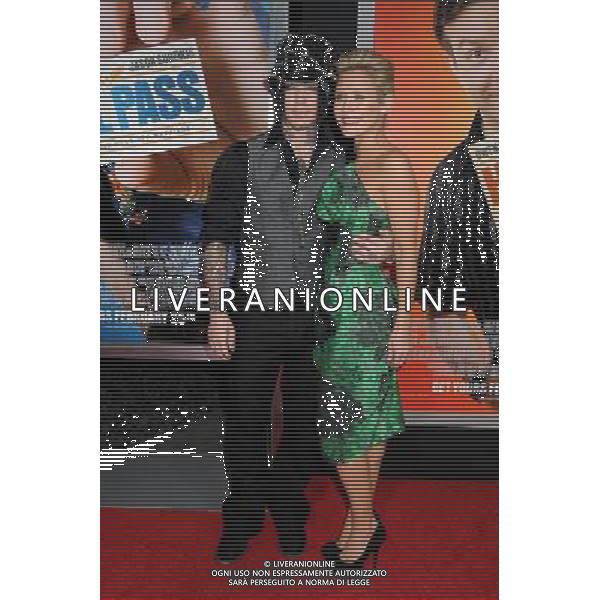 23 February 2011 - Hollywood, California - D.J. Ashba and Nicky Whelan. \'Hall Pass\' Los Angeles Premiere held at The Cinerama Dome. Photo Credit: Byron Purvis/AdMedia AG. ALDO LIVERANI SAS ITALY ONLY *** Local Caption *** .