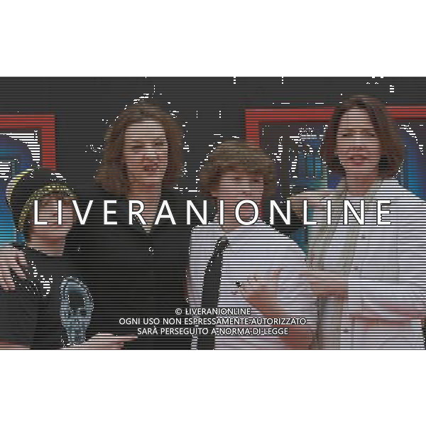 6 March 2011 - Hollywood, California - Joan Cusack (2nd L) and Ann Cusack and Kids. \'Mars Needs Moms 3D\' Los Angeles Premiere Held At The EL Capitan Theatre. Photo Credit: Kevan Brooks/AdMedia AG. ALDO LIVERANI SAS ITALY ONLY *** Local Caption *** .