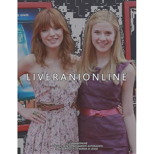 6 March 2011 - Hollywood, California - Bella Thorne (L) and Caroline Sunshine. \'Mars Needs Moms 3D\' Los Angeles Premiere Held At The EL Capitan Theatre. Photo Credit: Kevan Brooks/AdMedia AG. ALDO LIVERANI SAS ITALY ONLY *** Local Caption *** .