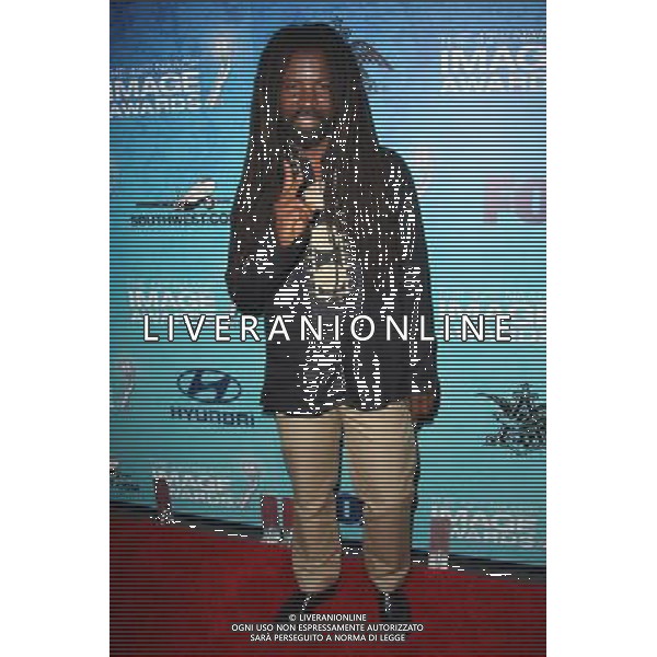 04 March 2011 - Beverly Hills, California - Rocky Dawuni. 42nd Annual NAACP Image Awards Post-show gala Held at The SLS Hotel. Photo Credit: Tommaso Boddi/AdMedia AG. ALDO LIVERANI SAS ITALY ONLY *** Local Caption *** .