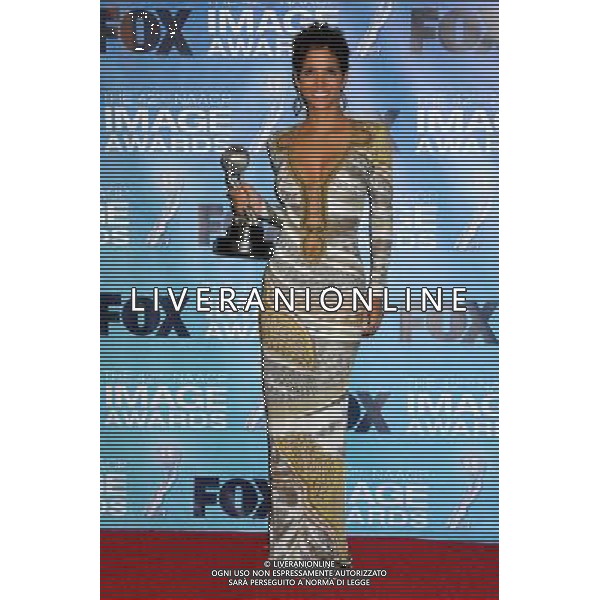 4 March 2011 - Los Angeles, California - Halle Berry. 42nd Annual NAACP Image Awards - Press Room held at the Shrine Auditorium. Photo Credit: Byron Purvis/AdMedia AG. ALDO LIVERANI SAS ITALY ONLY *** Local Caption *** .