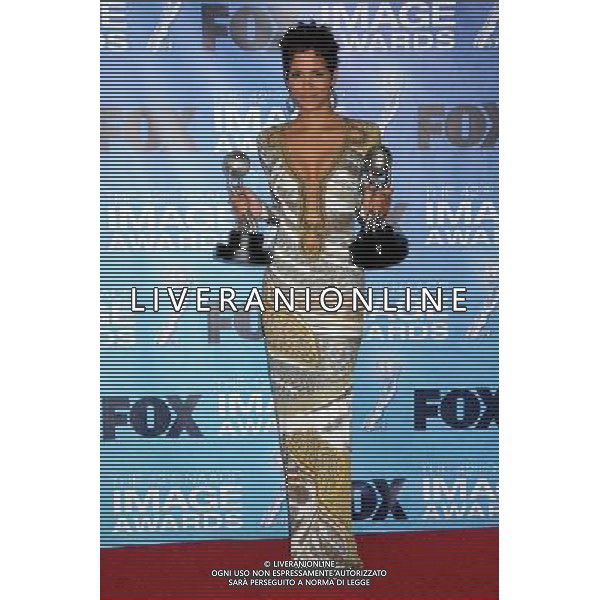 4 March 2011 - Los Angeles, California - Halle Berry. 42nd Annual NAACP Image Awards - Press Room held at the Shrine Auditorium. Photo Credit: Byron Purvis/AdMedia AG. ALDO LIVERANI SAS ITALY ONLY *** Local Caption *** .