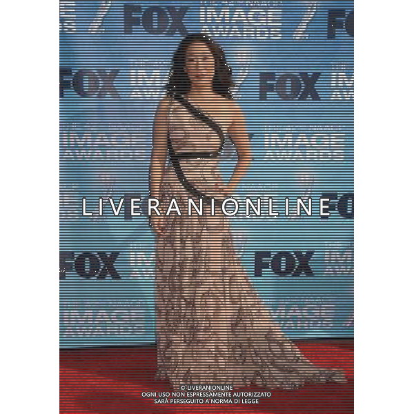 4 March 2011 - Los Angeles, California - Sandra Oh. 42nd Annual NAACP Image Awards - Arrivals held at the Shrine Auditorium. Photo Credit: Byron Purvis/AdMedia AG. ALDO LIVERANI SAS ITALY ONLY *** Local Caption *** .
