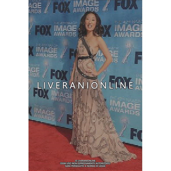 4 March 2011 - Los Angeles, California - Sandra Oh. 42nd Annual NAACP Image Awards - Arrivals held at the Shrine Auditorium. Photo Credit: Byron Purvis/AdMedia AG. ALDO LIVERANI SAS ITALY ONLY *** Local Caption *** .
