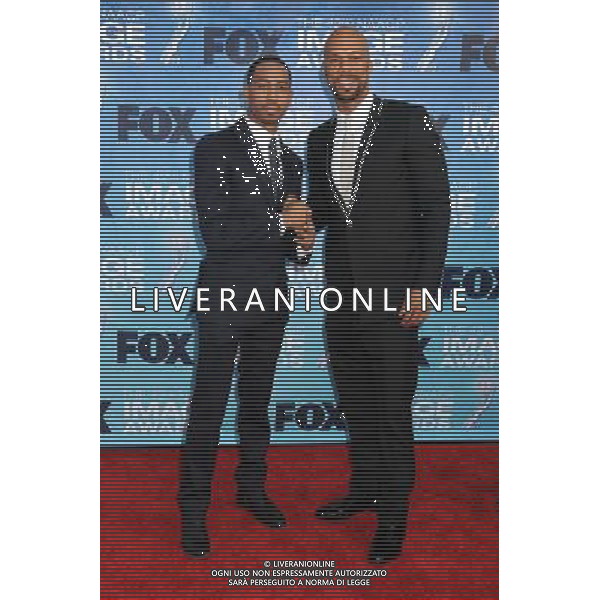 4 March 2011 - Los Angeles, California - Brandon T. Jackson and Common. 42nd Annual NAACP Image Awards - Arrivals held at the Shrine Auditorium. Photo Credit: Byron Purvis/AdMedia AG. ALDO LIVERANI SAS ITALY ONLY *** Local Caption *** .