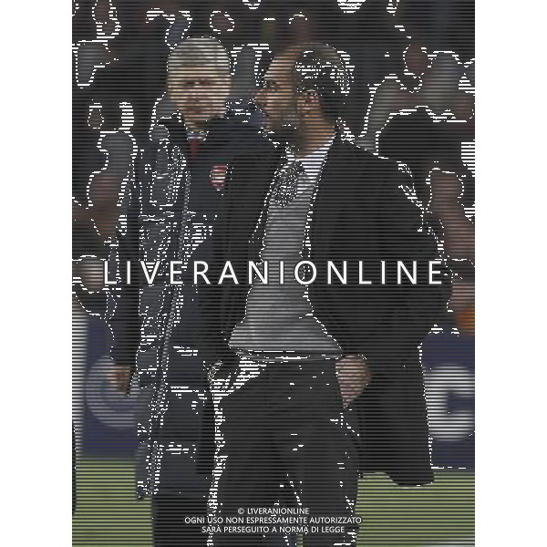 FC Barcelona\'s coach coach Pep Guardiola (r) and Arsenal\'s coach Arsene Wenger during UEFA Champions League match.March 8,2011. Photo: Acero / Alterphotos / ALFAQUI /AG ALDO LIVERANI SAS CHAMPIONS LEAGUE BARCELLONA ARSENAL - ITALY ONLY -