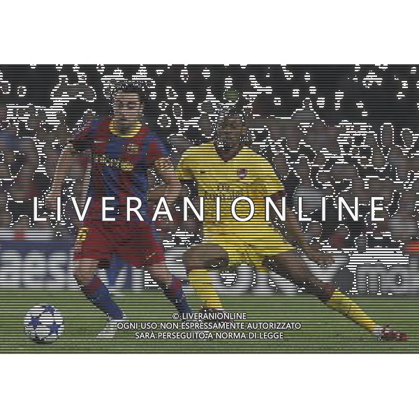 FC Barcelona\'s Xavi Hernandez (l) and Arsenal\'s Abou Diaby during UEFA Champions League match.March 8,2011. Photo: Acero / Alterphotos / ALFAQUI /AG ALDO LIVERANI SAS CHAMPIONS LEAGUE BARCELLONA ARSENAL - ITALY ONLY -