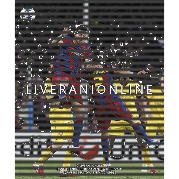 FC Barcelona\'s Sergio Busquets (c) and Daniel Alves (r) and Arsenal\'s Cesc Fabregas during UEFA Champions League match.March 8,2011. Photo: Acero / Alterphotos / ALFAQUI /AG ALDO LIVERANI SAS CHAMPIONS LEAGUE BARCELLONA ARSENAL - ITALY ONLY -