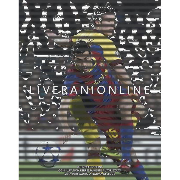 FC Barcelona\'s Sergio Busquets (d) and Arsenal\'s Robin Van Persie (t) during UEFA Champions League match.March 8,2011. Photo: Acero / Alterphotos / ALFAQUI /AG ALDO LIVERANI SAS CHAMPIONS LEAGUE BARCELLONA ARSENAL - ITALY ONLY -