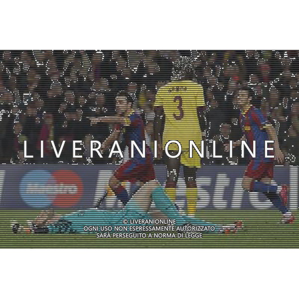 FC Barcelona\'s Xavi Hernandez (l) and Pedro Rodriguez celebrate goal in presence of Arsenal\'s Manuel Almunia (d) and Bacary Sagna dejecteds during UEFA Champions League match.March 8,2011. Photo: Acero / Alterphotos / ALFAQUI /AG ALDO LIVERANI SAS CHAMPIONS LEAGUE BARCELLONA ARSENAL - ITALY ONLY -