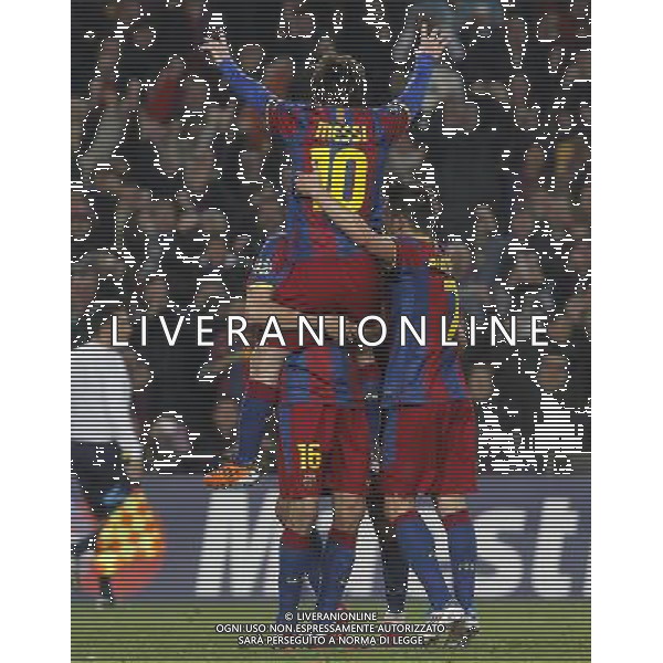 FC Barcelona\'s Leo Messi (t), Sergio Busquets (d) and David Villa celebrate goal during UEFA Champions League match.March 8,2011. Photo: Acero / Alterphotos / ALFAQUI /AG ALDO LIVERANI SAS CHAMPIONS LEAGUE BARCELLONA ARSENAL - ITALY ONLY -