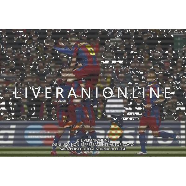 FC Barcelona\'s Leo Messi, Sergio Busquets, Pedro Rodriguez, Andres Iniesta and Daniel Alves celebrate goal during UEFA Champions League match.March 8,2011. Photo: Acero / Alterphotos / ALFAQUI /AG ALDO LIVERANI SAS CHAMPIONS LEAGUE BARCELLONA ARSENAL - ITALY ONLY -