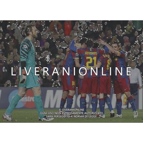 FC Barcelona\'s players celebrate goal in presence of Arsenal\'s Manuel Almunia dejected during UEFA Champions League match.March 8,2011. Photo: Acero / Alterphotos / ALFAQUI /AG ALDO LIVERANI SAS CHAMPIONS LEAGUE BARCELLONA ARSENAL - ITALY ONLY -