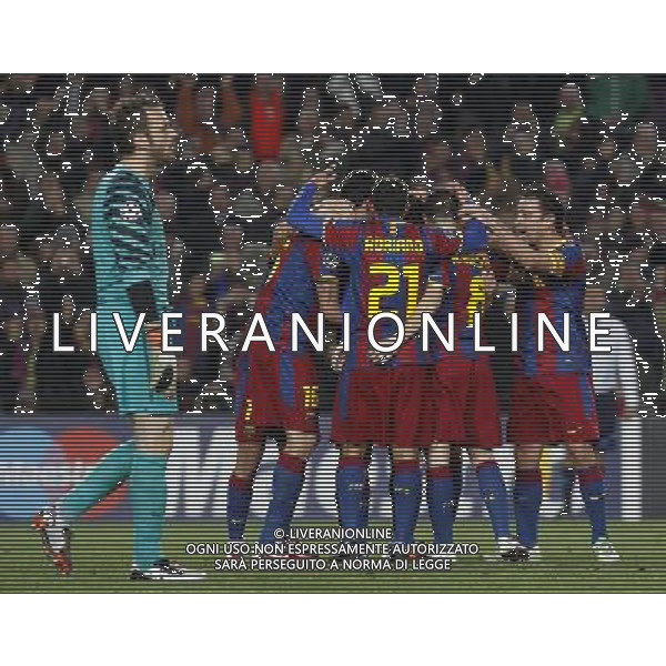 FC Barcelona\'s players celebrate goal in presence of Arsenal\'s Manuel Almunia dejected during UEFA Champions League match.March 8,2011. Photo: Acero / Alterphotos / ALFAQUI /AG ALDO LIVERANI SAS CHAMPIONS LEAGUE BARCELLONA ARSENAL - ITALY ONLY -