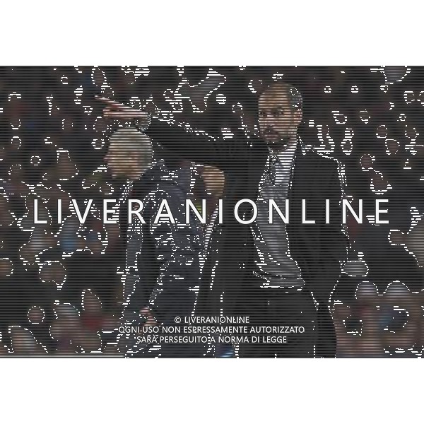 FC Barcelona\'s coach coach Pep Guardiola (r) and Arsenal\'s coach Arsene Wenger during UEFA Champions League match.March 8,2011. Photo: Acero / Alterphotos / ALFAQUI /AG ALDO LIVERANI SAS CHAMPIONS LEAGUE BARCELLONA ARSENAL - ITALY ONLY -