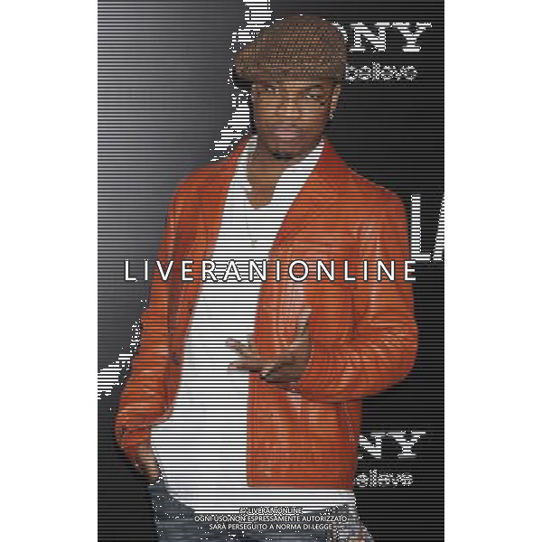 Ne-Yo Photo by Gilbert Flores \'Battle: Los Angeles \' Los Angeles Premiere at the Regency Village Theatre March 8, 2011 - Westwood, California /AG ALDO LIVERANI SAS - ITALY ONLY -