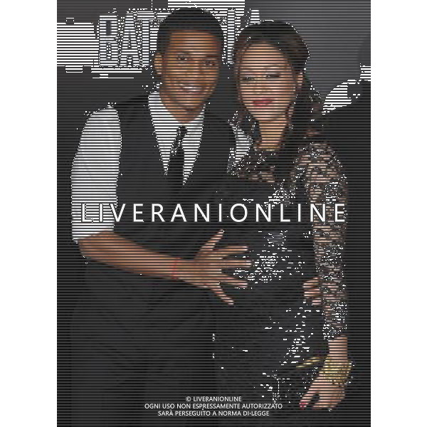 Tia Mowry and husband Cory Hardrict Photo by Gilbert Flores \'Battle: Los Angeles \' Los Angeles Premiere at the Regency Village Theatre March 8, 2011 - Westwood, California /AG ALDO LIVERANI SAS - ITALY ONLY -