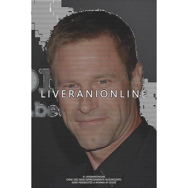 Aaron Eckhart Photo by Janet Gough \'Battle: Los Angeles\' Los Angeles Premiere at the Regency Village Theatre March 8, 2011 - Westwood, California /AG ALDO LIVERANI SAS - ITALY ONLY -