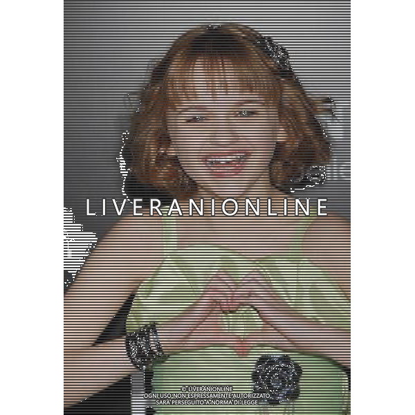 Joey King Photo by Janet Gough \'Battle: Los Angeles\' Los Angeles Premiere at the Regency Village Theatre March 8, 2011 - Westwood, California /AG ALDO LIVERANI SAS - ITALY ONLY -