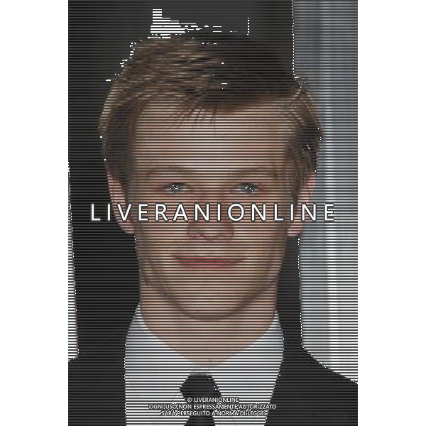 Lucas Till Photo by Janet Gough \'Battle: Los Angeles\' Los Angeles Premiere at the Regency Village Theatre March 8, 2011 - Westwood, California /AG ALDO LIVERANI SAS - ITALY ONLY -